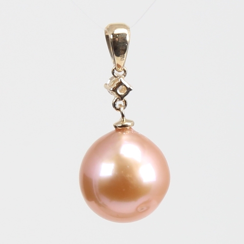 1234 - A modern 14ct gold whole Southsea pearl and diamond drop pendant, set with 0.05ct round brilliant-cu... 