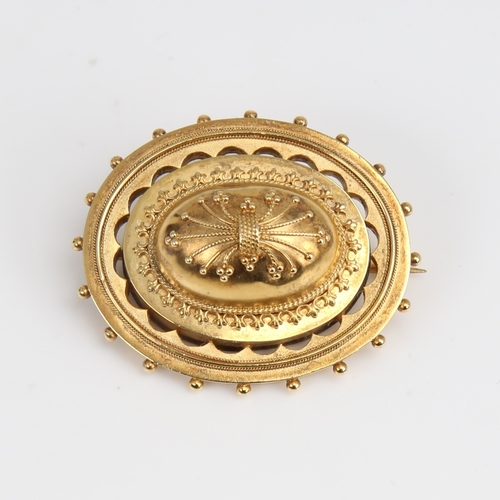 1235 - A Victorian unmarked gold bombe Etruscan style memorial brooch, openwork settings with bead edge and... 