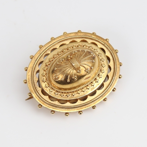 1235 - A Victorian unmarked gold bombe Etruscan style memorial brooch, openwork settings with bead edge and... 