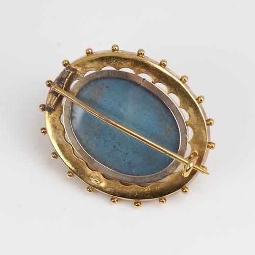 1235 - A Victorian unmarked gold bombe Etruscan style memorial brooch, openwork settings with bead edge and... 