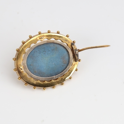 1235 - A Victorian unmarked gold bombe Etruscan style memorial brooch, openwork settings with bead edge and... 