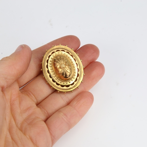 1235 - A Victorian unmarked gold bombe Etruscan style memorial brooch, openwork settings with bead edge and... 