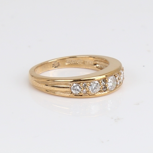 1241 - A modern 9ct gold diamond half hoop ring set with round brilliant and eight-cut diamonds, total diam... 