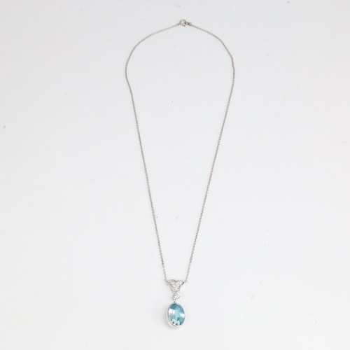 1242 - A platinum zircon and diamond pendant necklace, set with 9ct oval mixed-cut zircon drop and round br... 