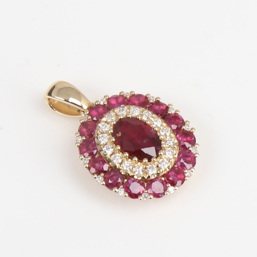 1243 - A modern 14ct gold ruby and diamond cluster pendant, set with oval mixed and round-cut rubies with r... 