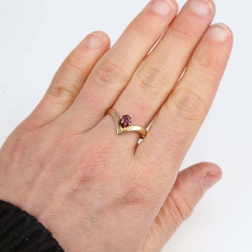 1254 - A late 20th century 9ct gold ruby wishbone ring, set with round-cut ruby, hallmarks Birmingham 1979,... 