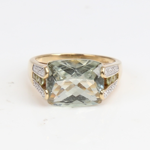 1255 - A modern 9ct gold green beryl and diamond dress ring, set with barrel-cut beryl and single-cut diamo... 