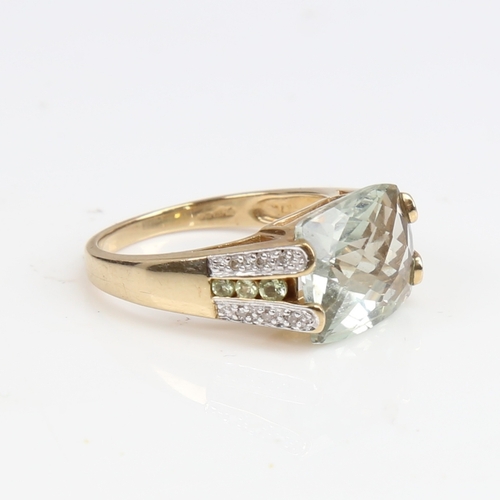 1255 - A modern 9ct gold green beryl and diamond dress ring, set with barrel-cut beryl and single-cut diamo... 