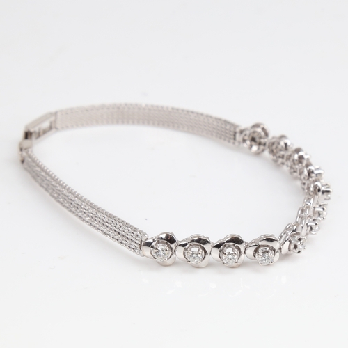 1256 - A late 20th century 18ct white gold diamond trefoil bracelet, set with round brilliant-cut diamonds,... 