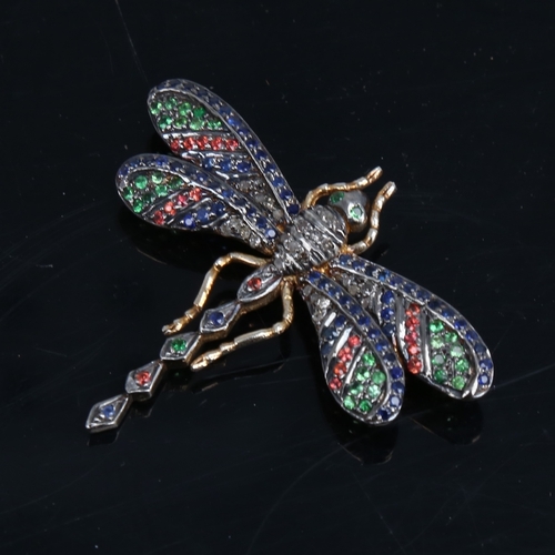 1258 - An silver-gilt gem set figural dragonfly brooch, gemstones include sapphires emeralds and diamonds, ... 