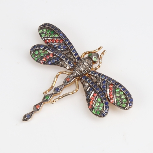 1258 - An silver-gilt gem set figural dragonfly brooch, gemstones include sapphires emeralds and diamonds, ... 