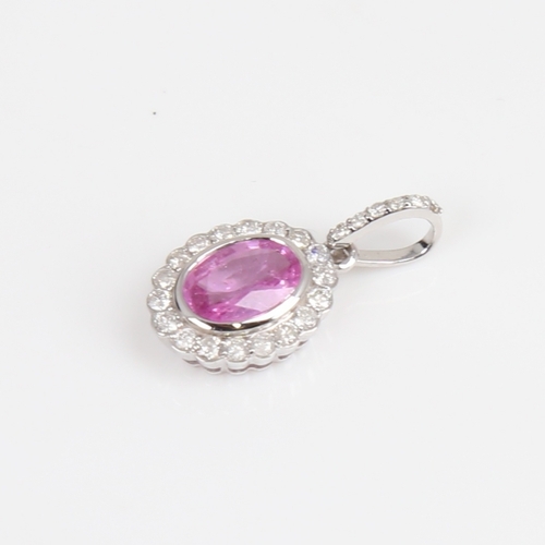 1261 - A modern 14ct white gold pink sapphire and diamond cluster drop pendant, set with oval mixed-cut sap... 