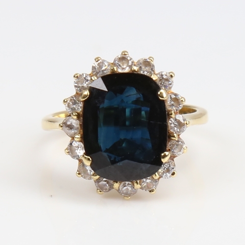 1264 - A late 20th century 18ct gold sapphire and white zircon cluster ring, set with oval mixed-cut sapphi... 