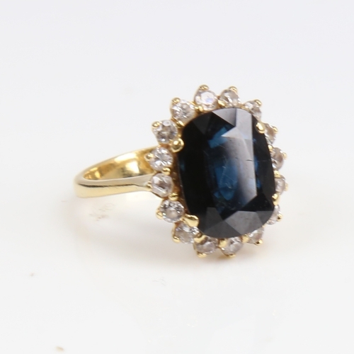 1264 - A late 20th century 18ct gold sapphire and white zircon cluster ring, set with oval mixed-cut sapphi... 