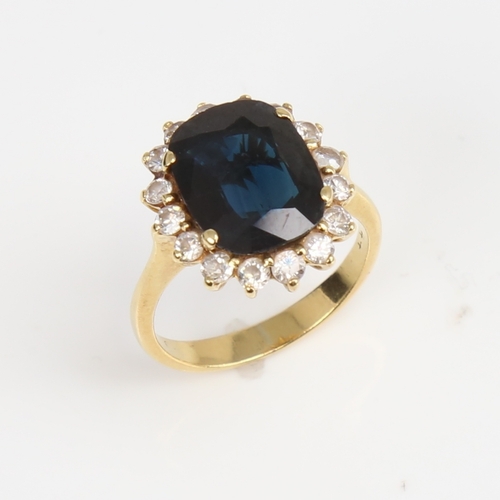 1264 - A late 20th century 18ct gold sapphire and white zircon cluster ring, set with oval mixed-cut sapphi... 