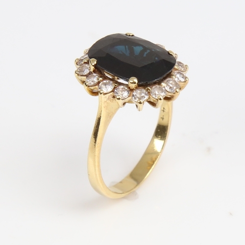 1264 - A late 20th century 18ct gold sapphire and white zircon cluster ring, set with oval mixed-cut sapphi... 