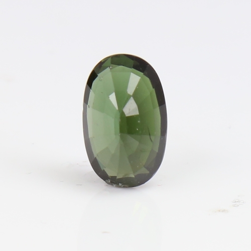 1266 - A 6.73ct unmounted oval mixed-cut green tourmaline, dimensions: 14.66mm x 9.27mm x 7.08mm, 1.36g