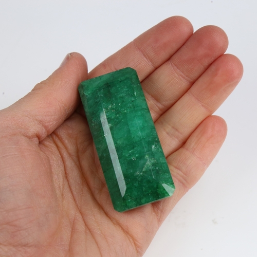 1282 - A 284ct unmounted rectangular emerald step-cut emerald, dimensions: 55.00mm x 25.00mm x 22.00mm, ind... 