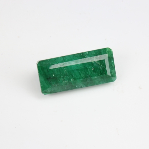 1282 - A 284ct unmounted rectangular emerald step-cut emerald, dimensions: 55.00mm x 25.00mm x 22.00mm, ind... 