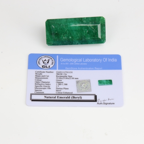 1282 - A 284ct unmounted rectangular emerald step-cut emerald, dimensions: 55.00mm x 25.00mm x 22.00mm, ind... 