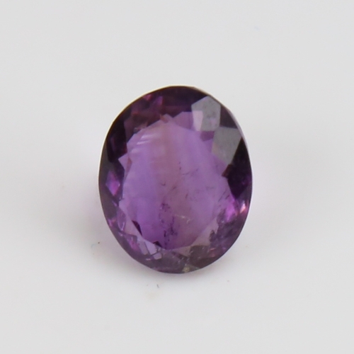 1287 - A 5.46ct unmounted oval mixed-cut amethyst, dimensions: 12.40mm x 9.99mm x 6.64mm, 1.09g, with GJSPC... 