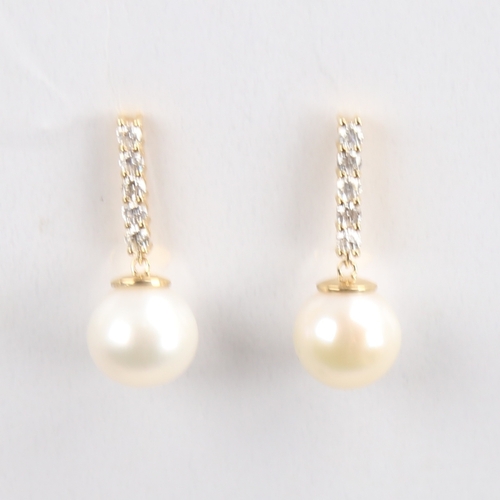 1295 - A modern pair of 14ct gold whole Southsea cultured pearl and diamond drop earrings, set with modern ... 