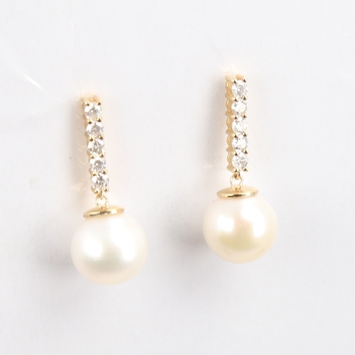 1295 - A modern pair of 14ct gold whole Southsea cultured pearl and diamond drop earrings, set with modern ... 