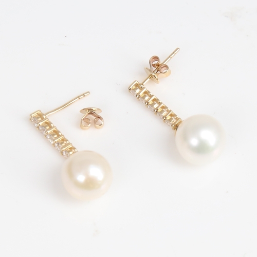 1295 - A modern pair of 14ct gold whole Southsea cultured pearl and diamond drop earrings, set with modern ... 