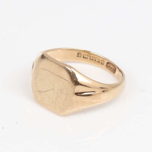 1296 - A late 20th century 9ct gold signet ring, maker's marks KBSP, hallmarks Birmingham 1983, setting hei... 