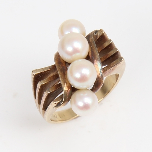 1297 - MIKIMOTO - an Art Deco style 14ct gold pearl dress ring, openwork stylised shoulders, setting height... 