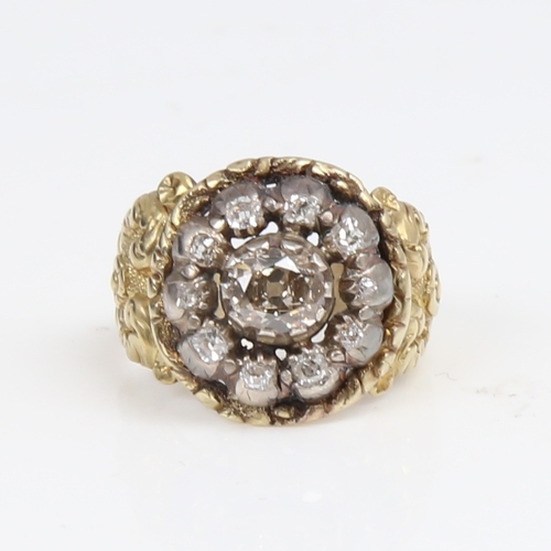 1299 - A large 19th century unmarked gold diamond cluster ring, set with old-cut diamonds and relief floral... 