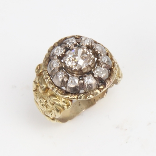 1299 - A large 19th century unmarked gold diamond cluster ring, set with old-cut diamonds and relief floral... 