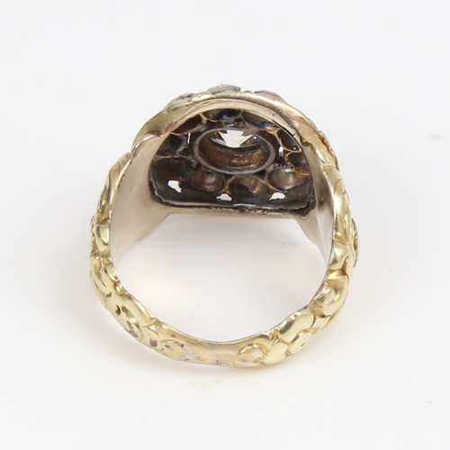 1299 - A large 19th century unmarked gold diamond cluster ring, set with old-cut diamonds and relief floral... 