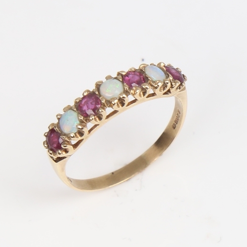 1397 - A late 20th century 9ct gold 7-stone opal and garnet half hoop ring, set with round cabochon opals a... 