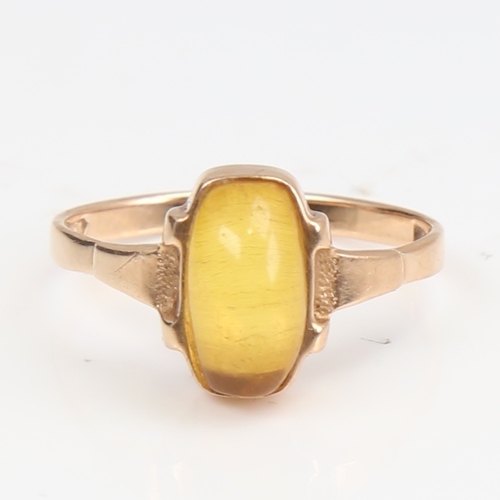 1398 - A Continental 14ct gold cabochon yellow stone dress ring, setting height 11.3mm, size P, 2.5g