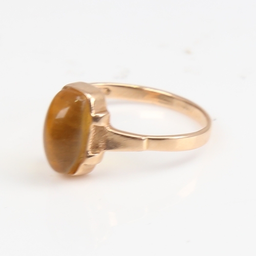 1398 - A Continental 14ct gold cabochon yellow stone dress ring, setting height 11.3mm, size P, 2.5g