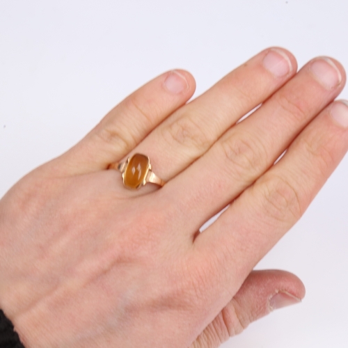 1398 - A Continental 14ct gold cabochon yellow stone dress ring, setting height 11.3mm, size P, 2.5g