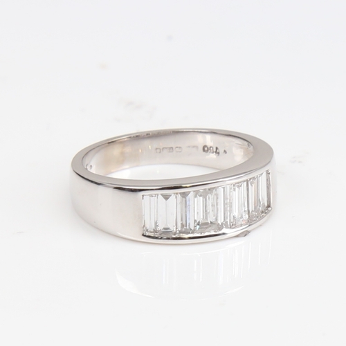 1405 - A modern 18ct white gold diamond quarter eternity ring, set with baguette-cut diamonds, total diamon... 