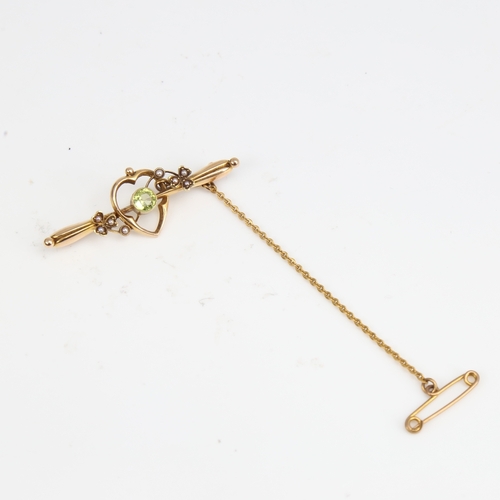 1406 - An early 20th century Art Nouveau 15ct gold peridot and split-pearl bar brooch, hallmarks Chester 19... 