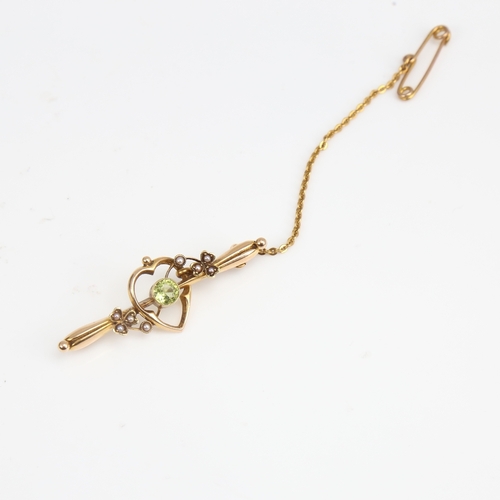 1406 - An early 20th century Art Nouveau 15ct gold peridot and split-pearl bar brooch, hallmarks Chester 19... 