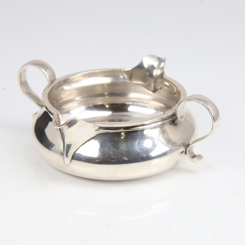 1409 - A late Victorian silver double-spout cream jug, circular squat form, by John Henry Rawlings, hallmar... 