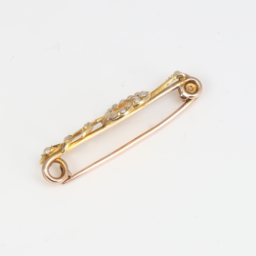 1414 - A Victorian unmarked gold and split-pearl heart and arrow brooch, brooch length 35.7mm, 2.7g