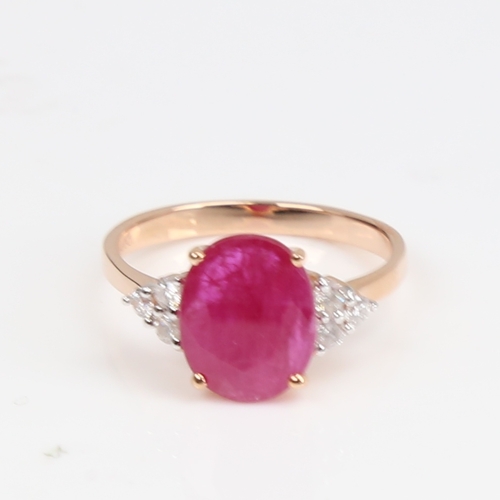 1418 - A modern 14ct rose gold ruby and diamond dress ring, set with oval mixed-cut ruby and round brillian... 