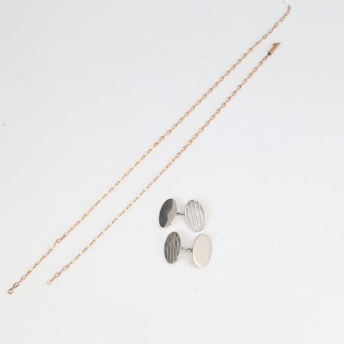 1419 - A 9ct gold chain necklace, 2.2g (A/F), and a pair of sterling silver engine turned cufflinks, 6.3g (... 