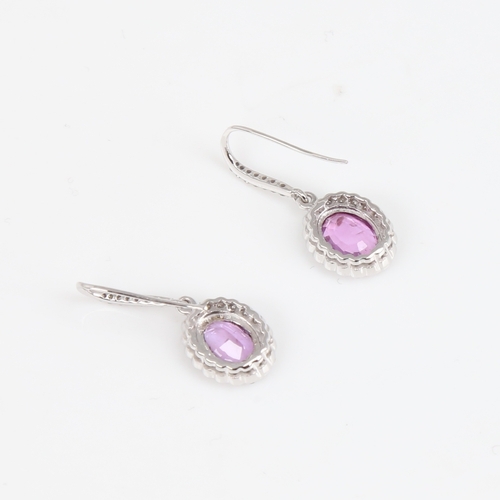 1423 - A modern pair of 14ct white gold pink sapphire and diamond cluster earrings, set with oval mixed-cut... 