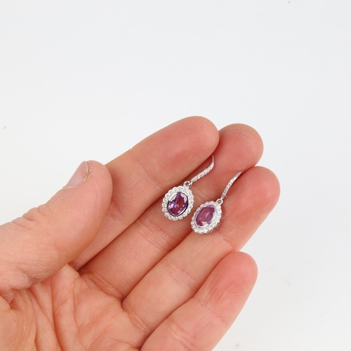 1423 - A modern pair of 14ct white gold pink sapphire and diamond cluster earrings, set with oval mixed-cut... 