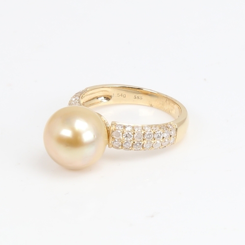 1426 - A modern 14ct gold whole cultured Southsea pearl and diamond dress ring, set with round brilliant-cu... 