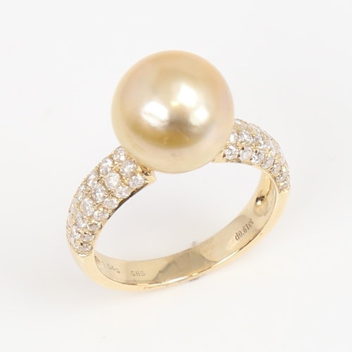 1426 - A modern 14ct gold whole cultured Southsea pearl and diamond dress ring, set with round brilliant-cu... 