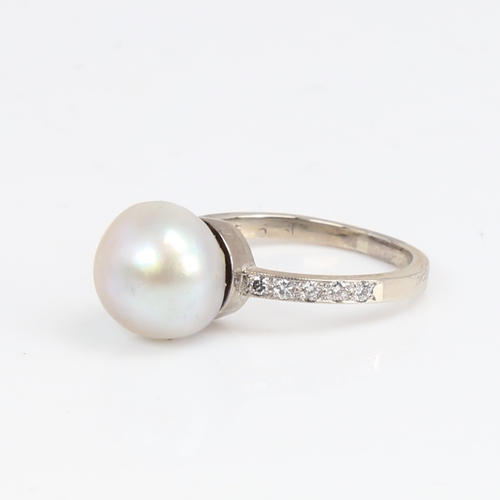 1428 - A 14ct white gold whole pearl and diamond ring, shoulders set with round brilliant-cut diamonds, pea... 