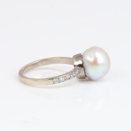 1428 - A 14ct white gold whole pearl and diamond ring, shoulders set with round brilliant-cut diamonds, pea... 